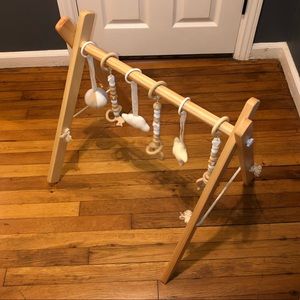 Wooden baby play gym with 6 toys